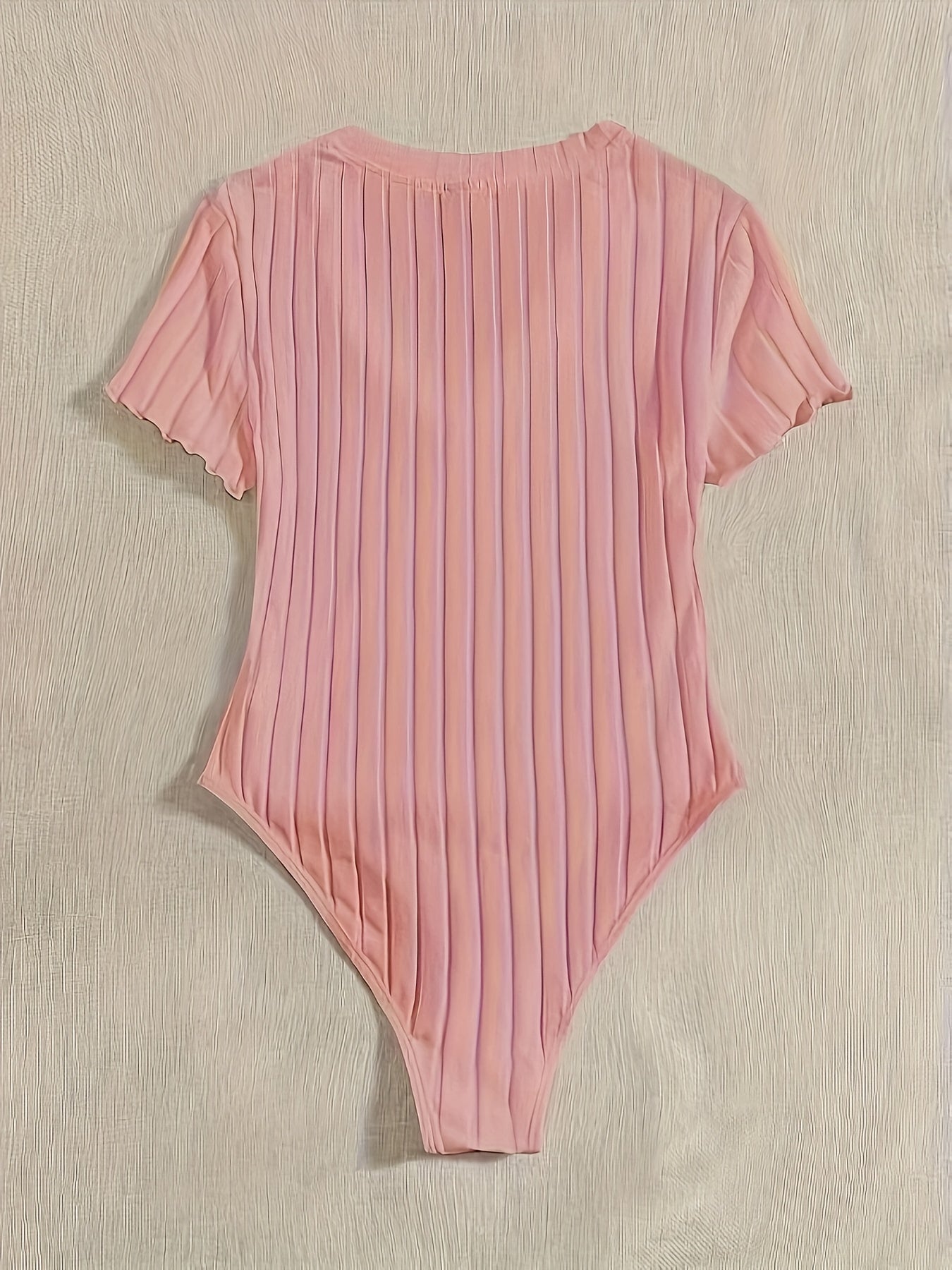 Stijlvolle effen V-hals body van hoogwaardig katoen | Shop nu! afbeelding 10