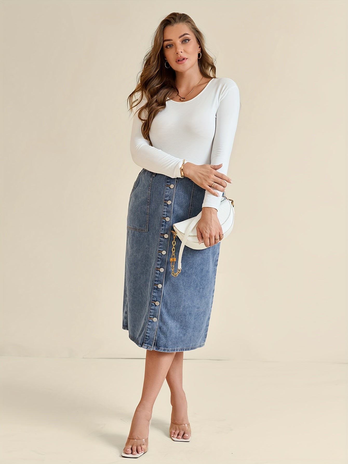 Koop de perfecte midi-denimrok met knoopdetail - tijdloos en stijlvol! afbeelding 6