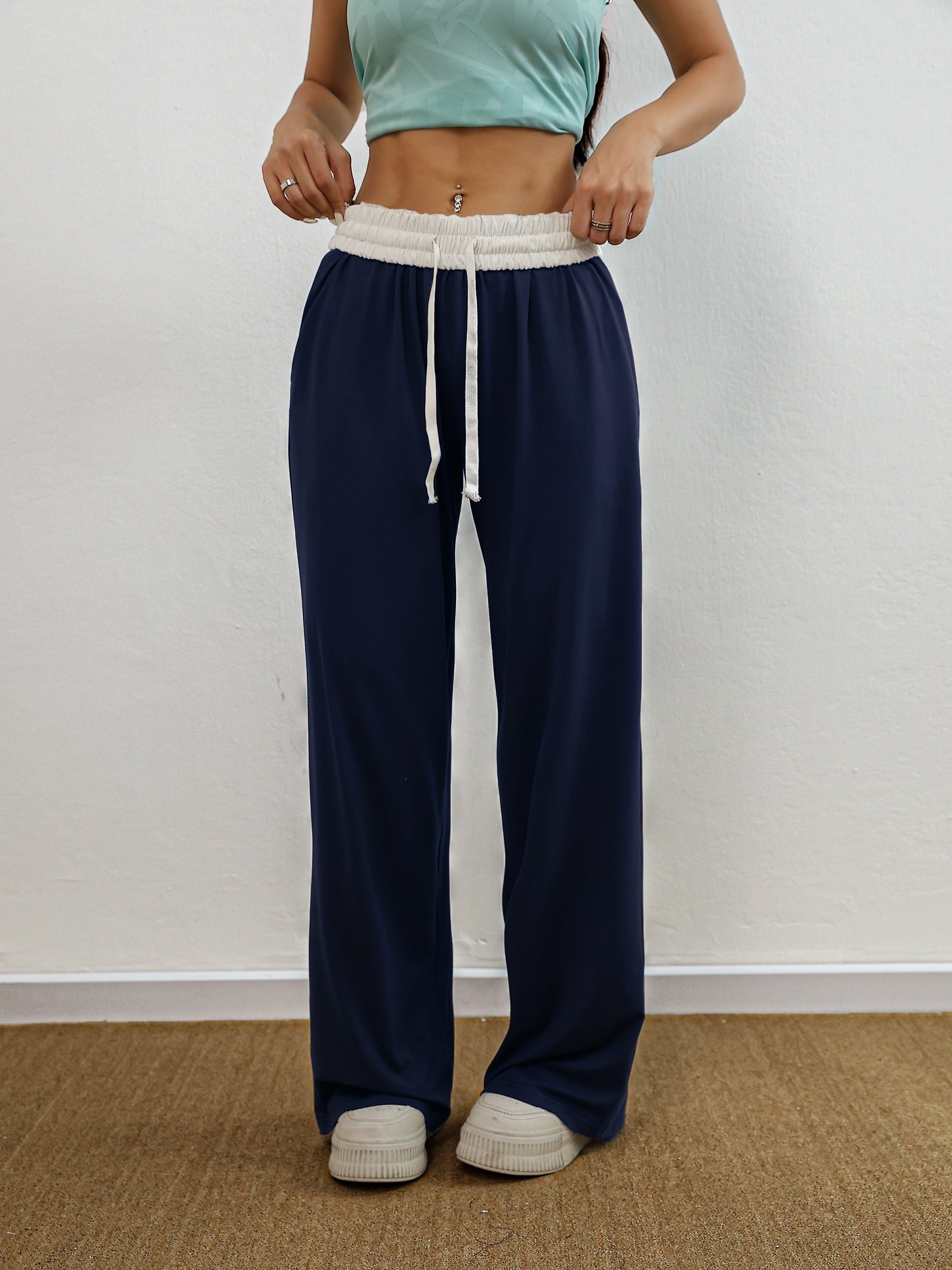 Comfortabele en stijlvolle trainingsbroek voor volwassenen | Loszittende pasvorm en elastische stof | Praktisch en trendy voor elke gelegenheid afbeelding 10