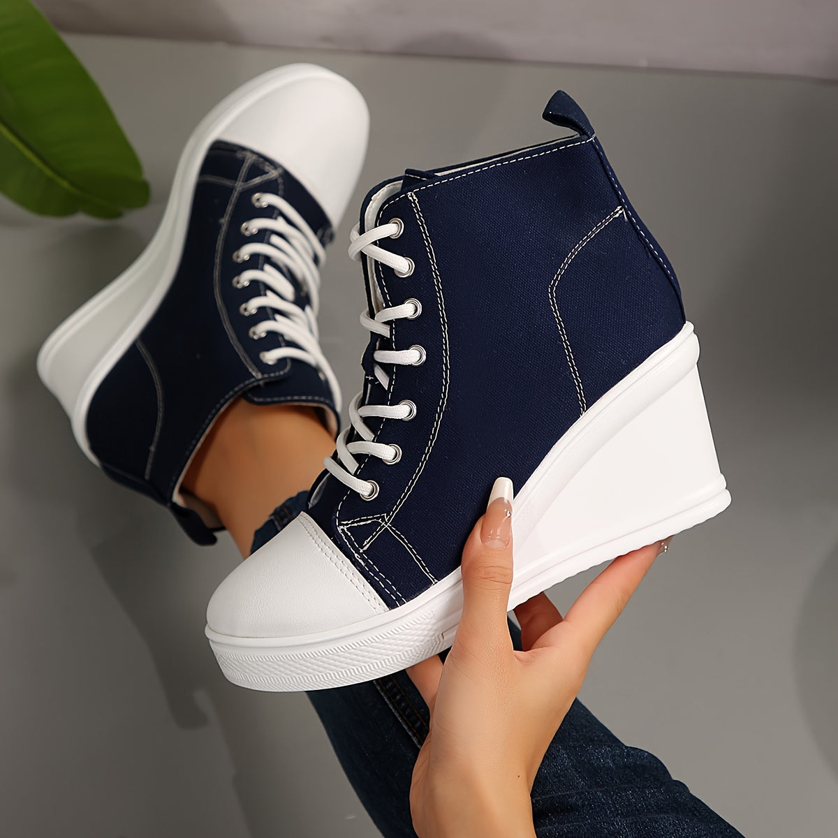 Stijlvolle dames enkellaarzen met wedge hak: de perfecte mix van comfort en fashion afbeelding 19