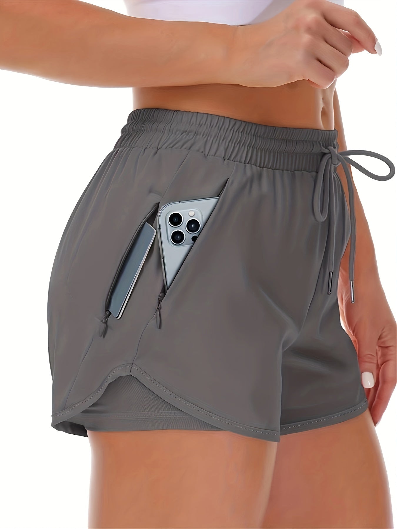 Sportieve 2-in-1 hardloopfitnessshort in effen kleur met meerdere zakken afbeelding 5