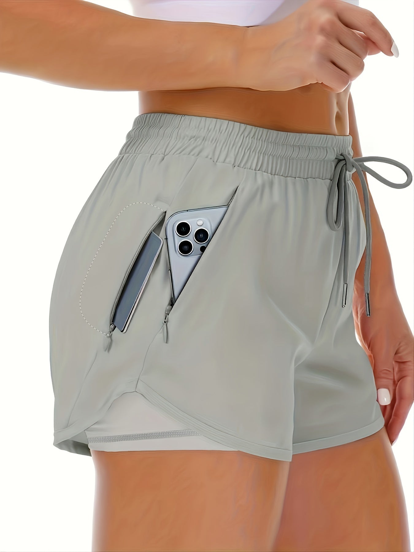 Sportieve 2-in-1 hardloopfitnessshort in effen kleur met meerdere zakken afbeelding 2
