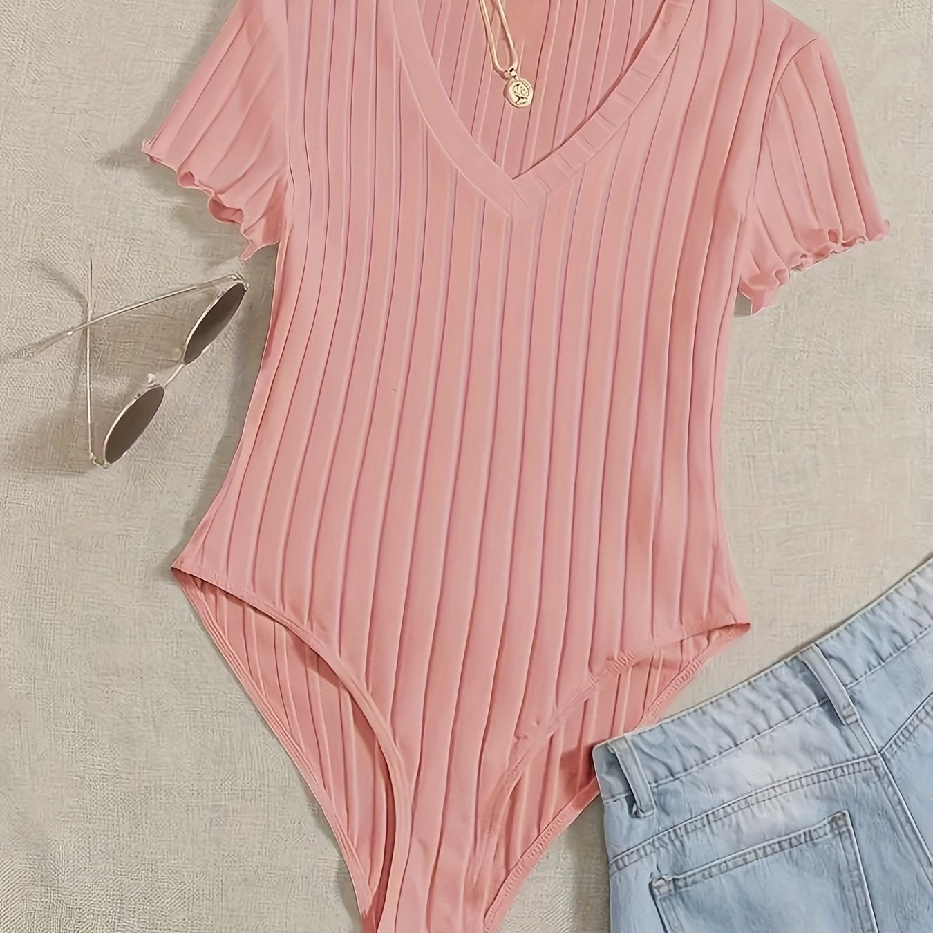 Stijlvolle effen V-hals body van hoogwaardig katoen | Shop nu! afbeelding 15