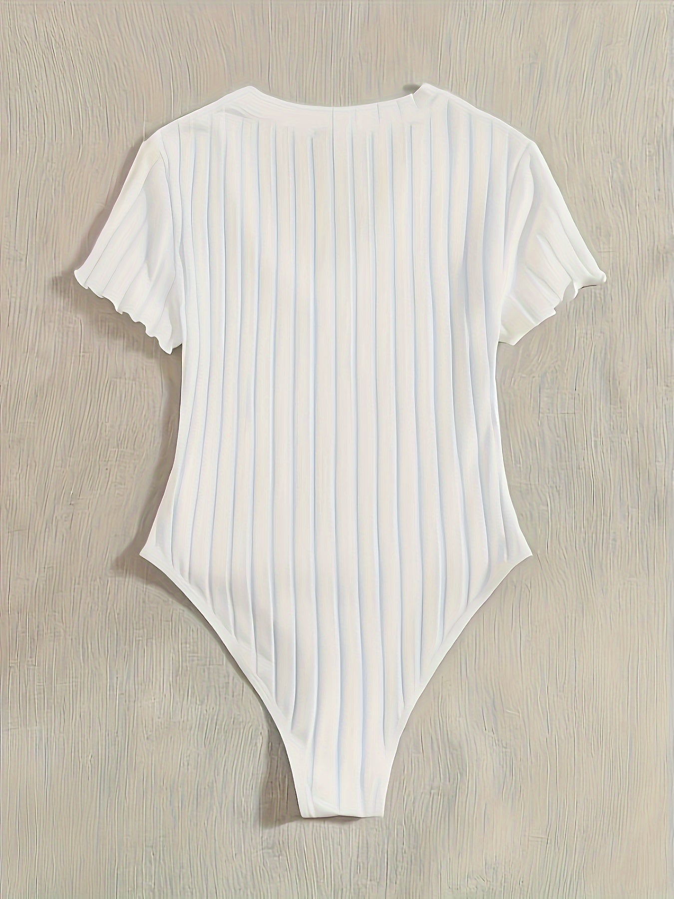 Stijlvolle effen V-hals body van hoogwaardig katoen | Shop nu! afbeelding 9