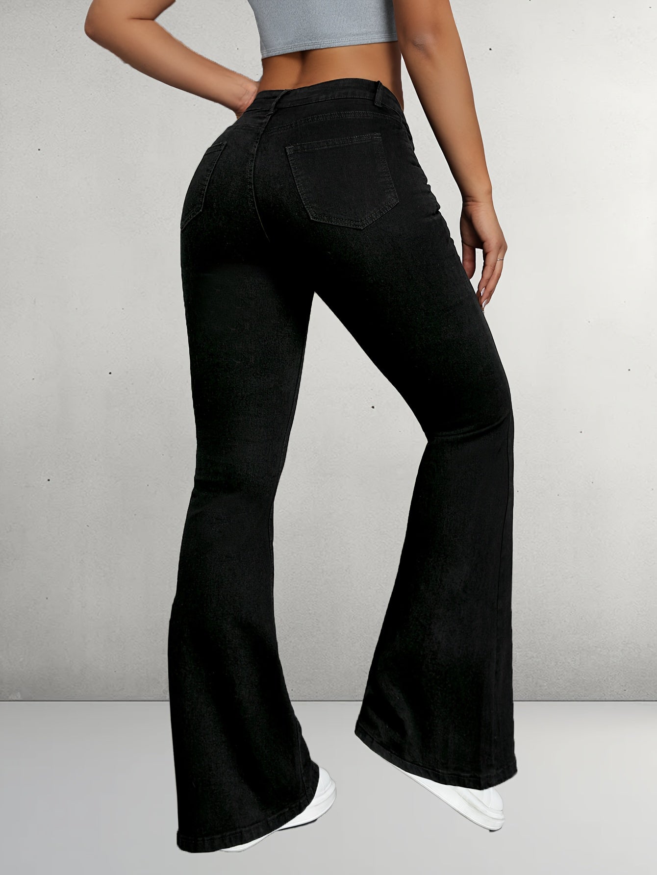 Elegante zwarte flare jeans met knoopdetail voor optimaal comfort afbeelding 4