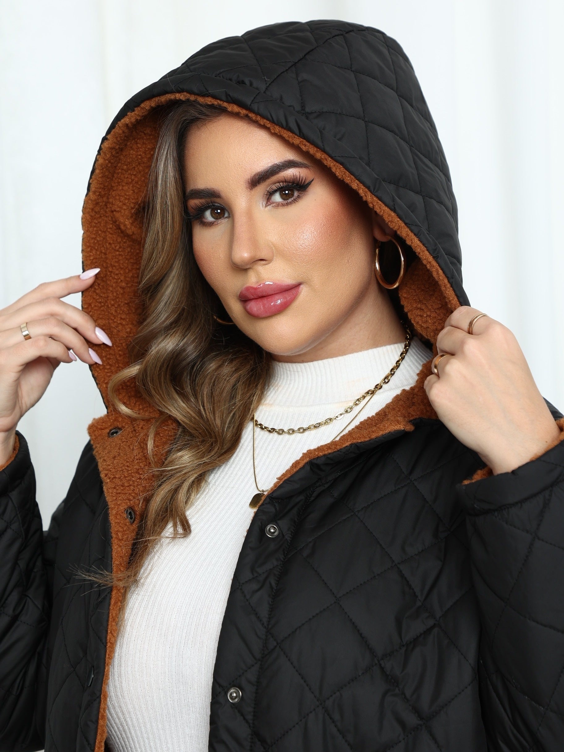 Warm en stijlvol de winter door met onze gewatteerde jas - ontdek de perfecte combinatie van comfort en functionaliteit afbeelding 6