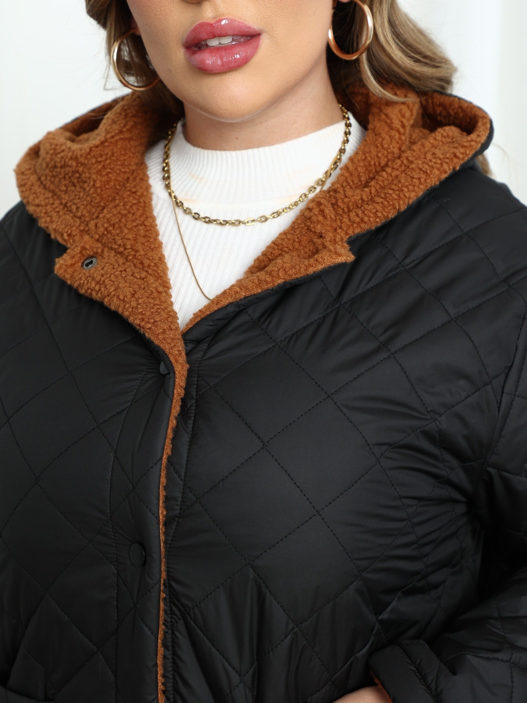 Warm en stijlvol de winter door met onze gewatteerde jas - ontdek de perfecte combinatie van comfort en functionaliteit afbeelding 4