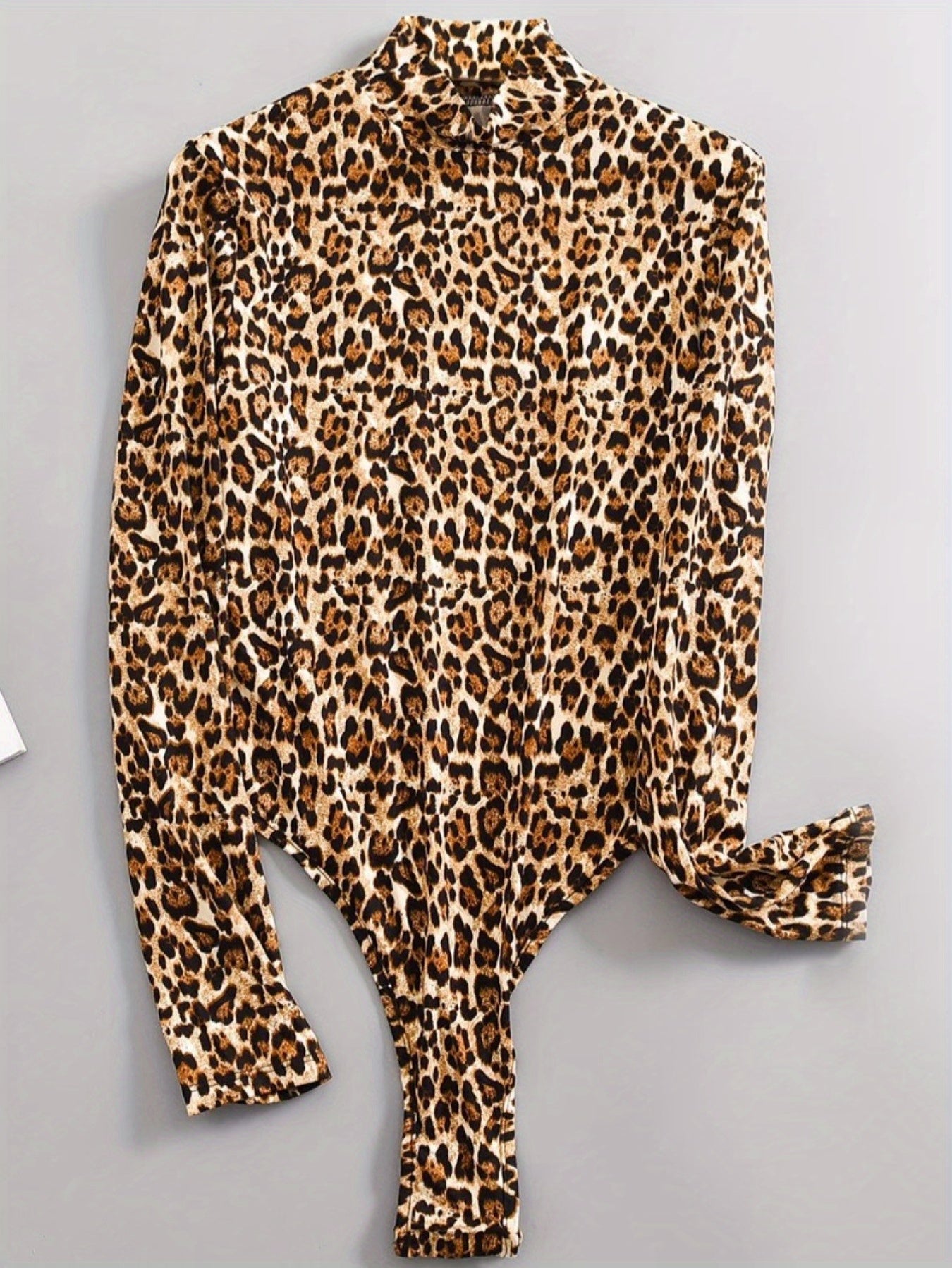 Stijlvolle gebreide luipaard body - comfortabel en trendy! afbeelding 8